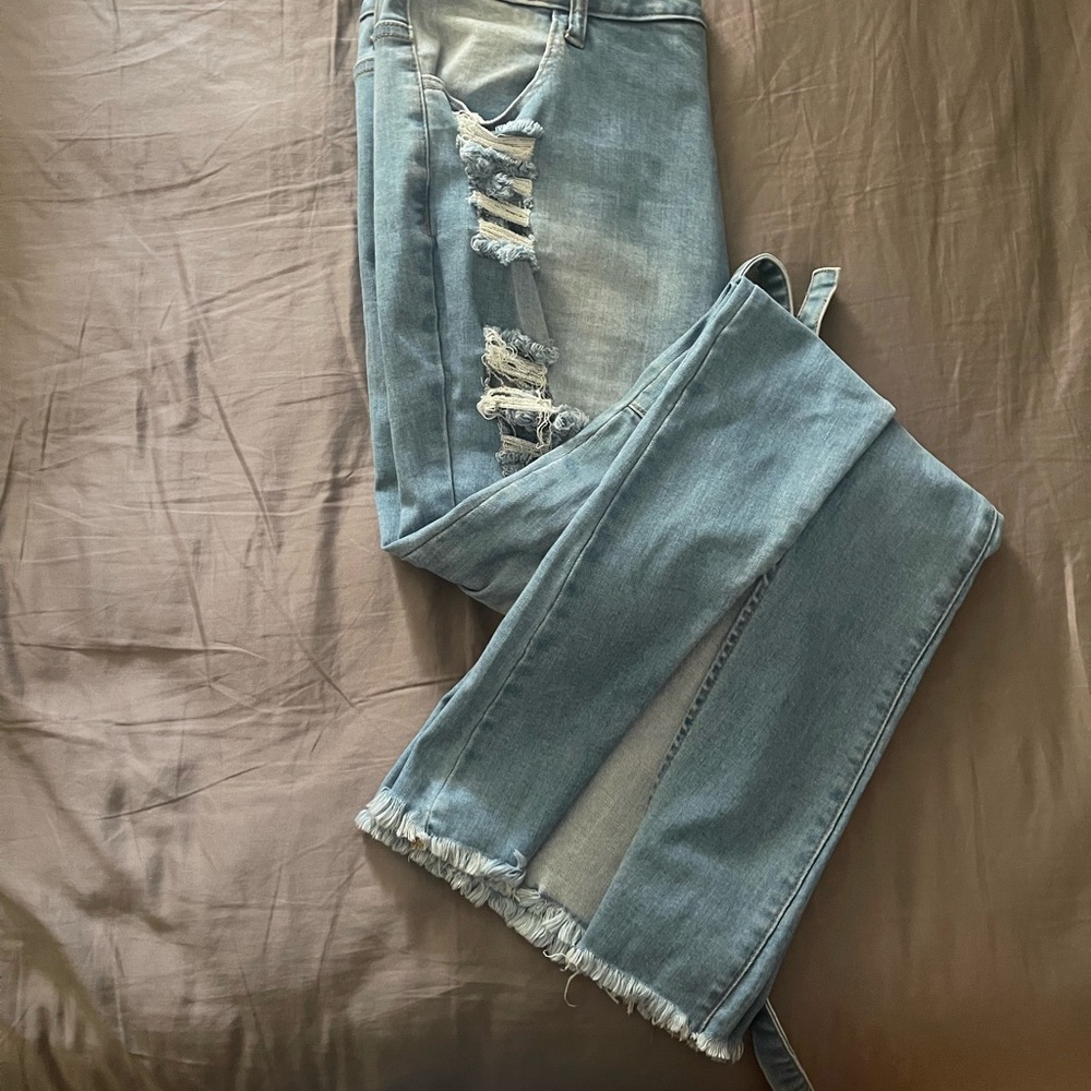 Fancy plus size bellbottoms. Unique bowtie and split in the front.